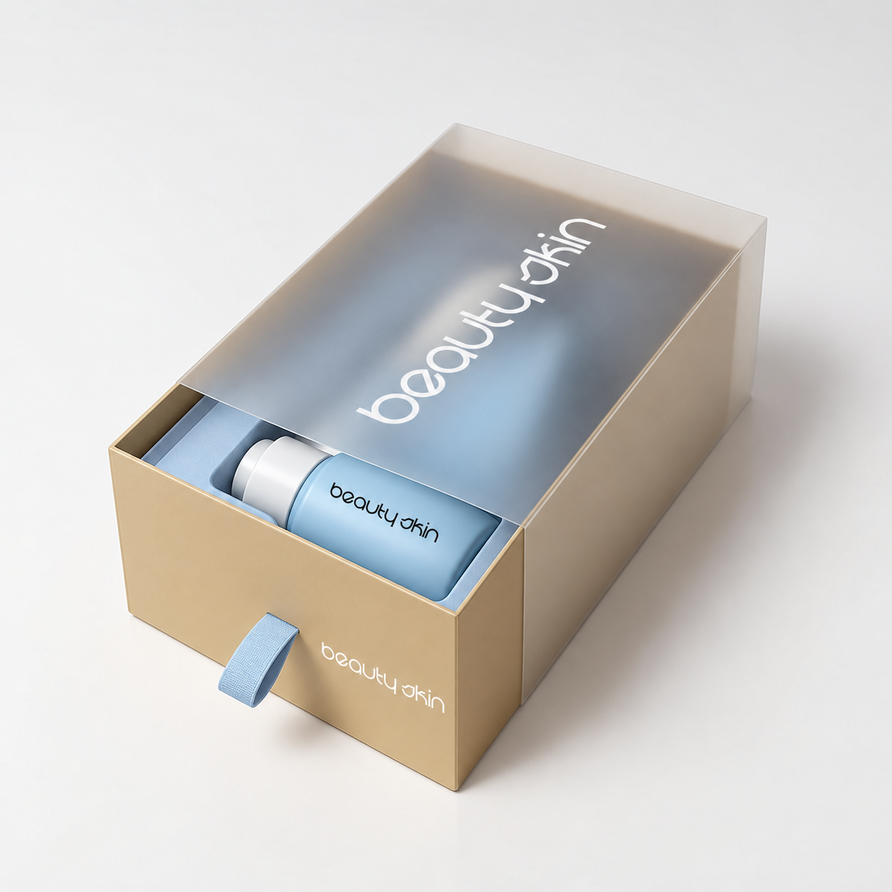 Gold cosmetic drawer box with a frosted transparent sleeve, blue ribbon pull and fitted blue insert holding a skincare bottle.